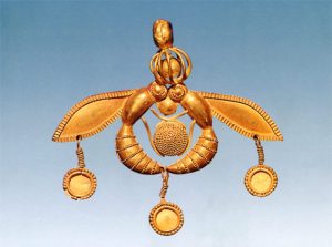Famous Minoan jewel that depicts 2 bees holding a honey comb.